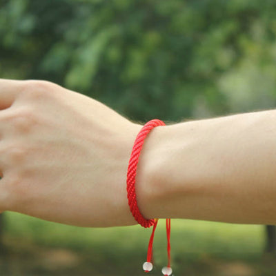 Bracelet tressé rouge